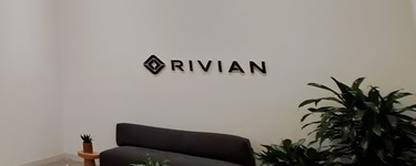 Rivan logo on clean white wall